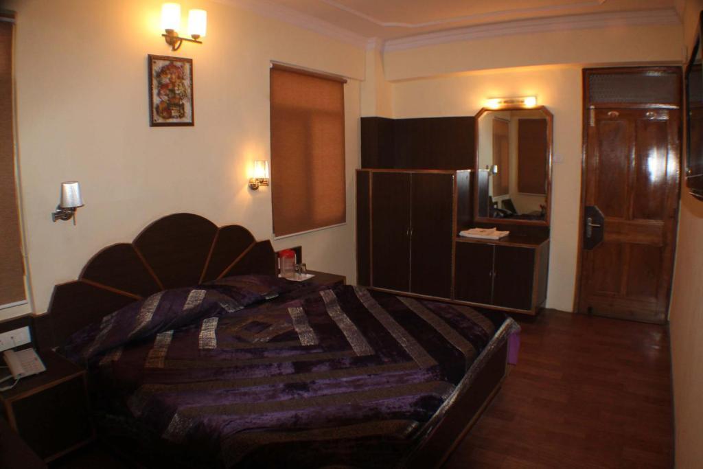 Hotel Prestige Shimla Bilik gambar